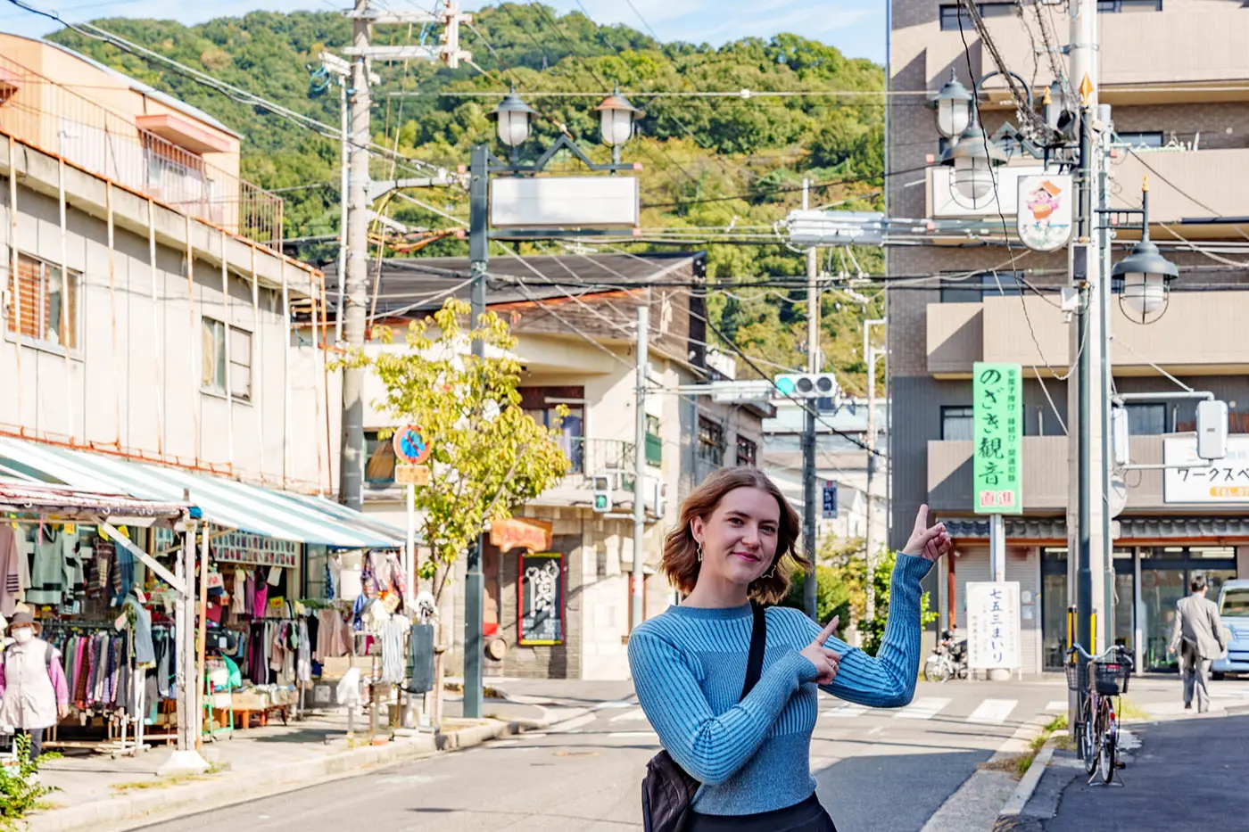 A guide striking a pose in the city