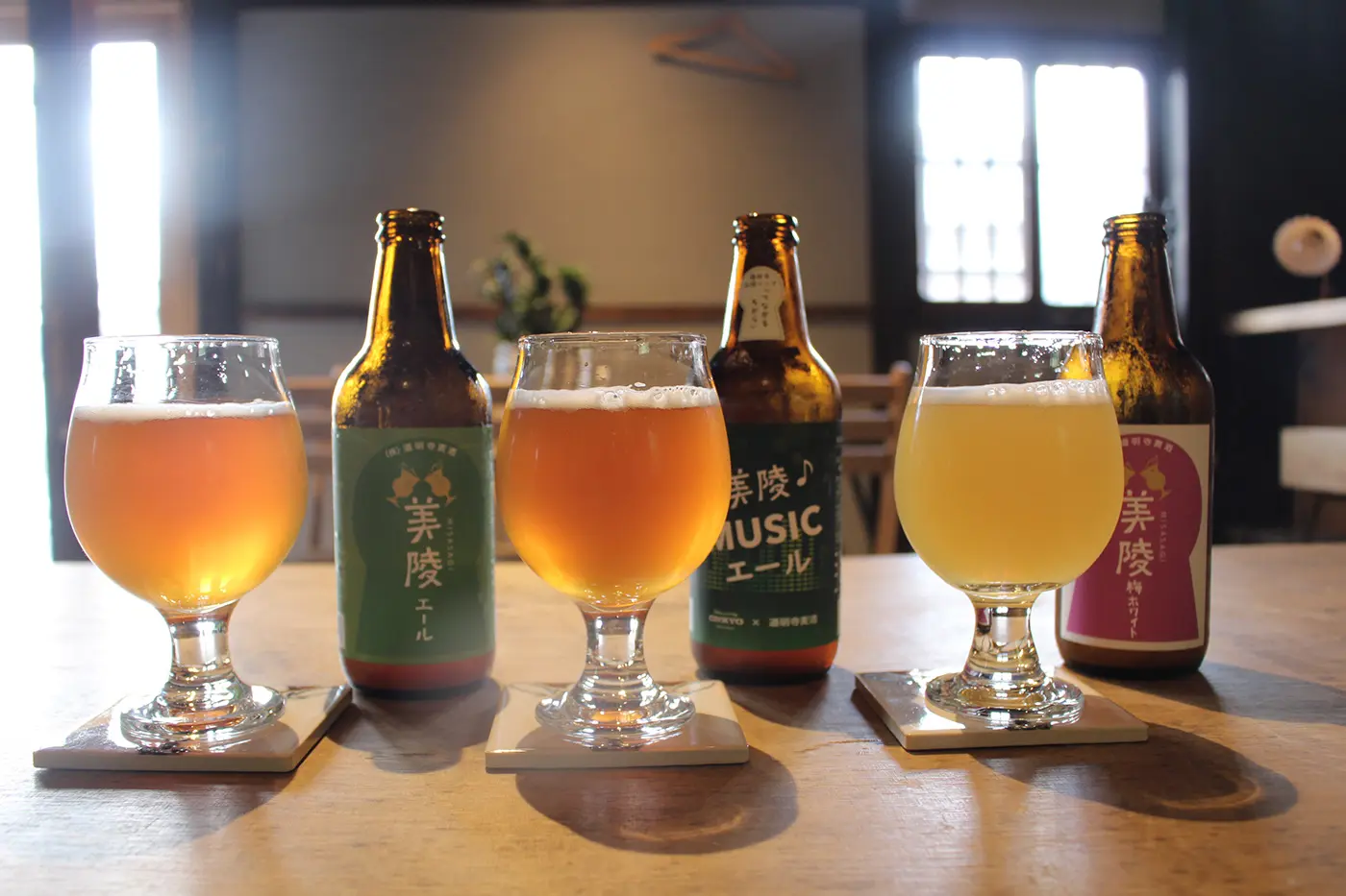 Pour each beer into a glass