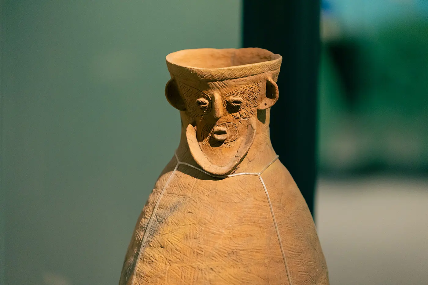 Pottery with human face