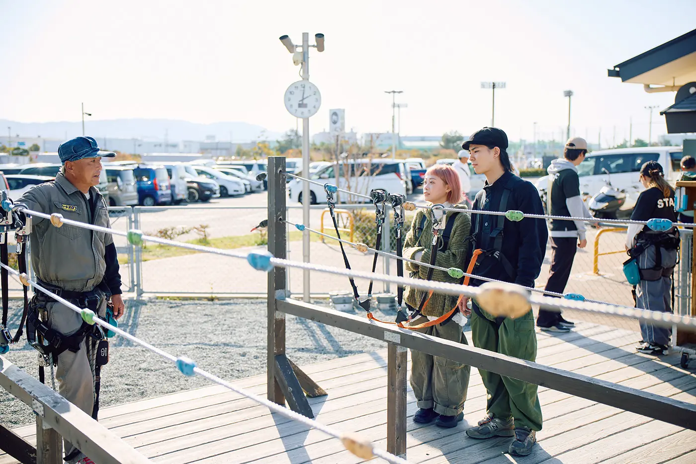 A couple receiving instructions on how to operate the device