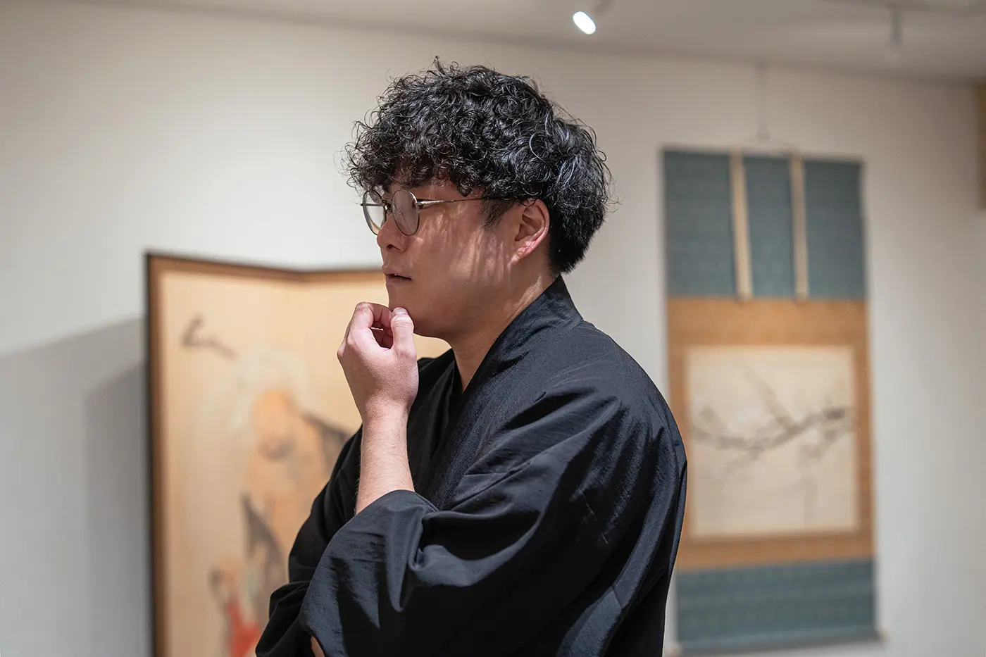 Minahada appreciating the artwork