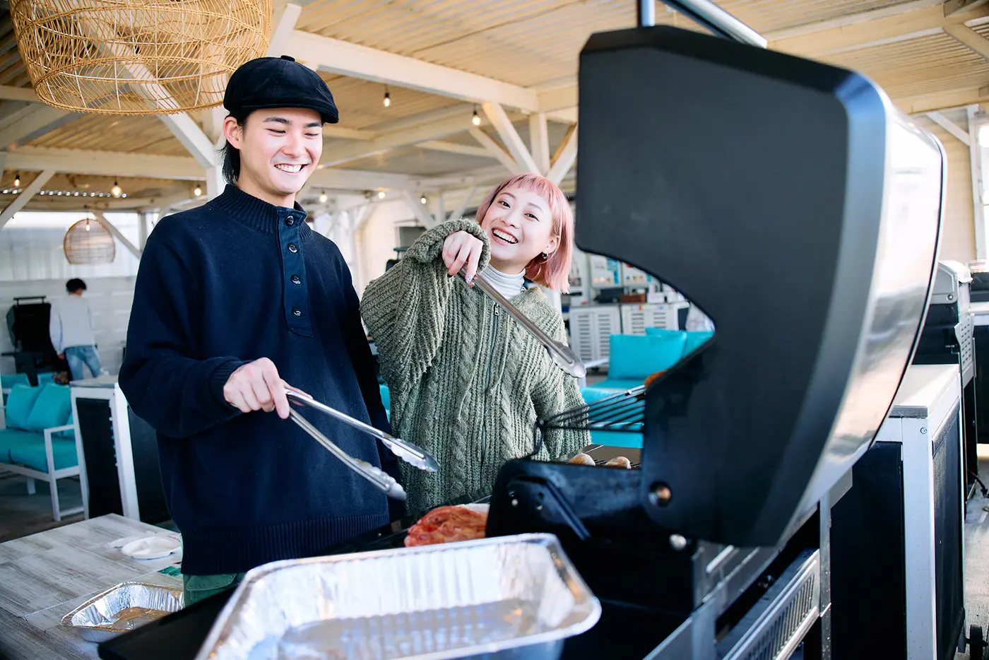 A couple enjoying a BBQ