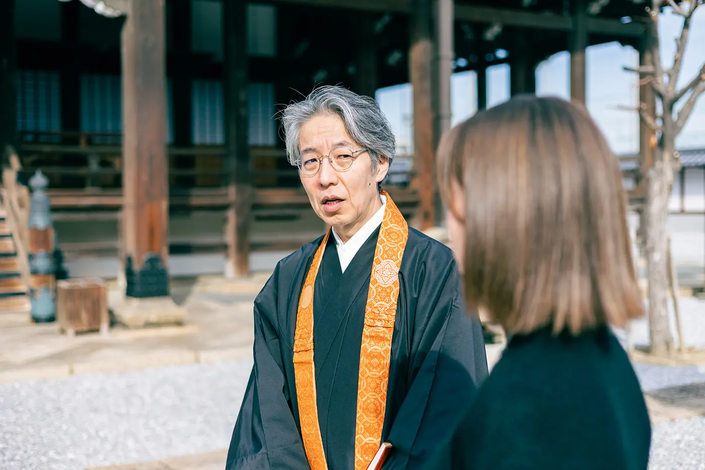People conversing in the main hall