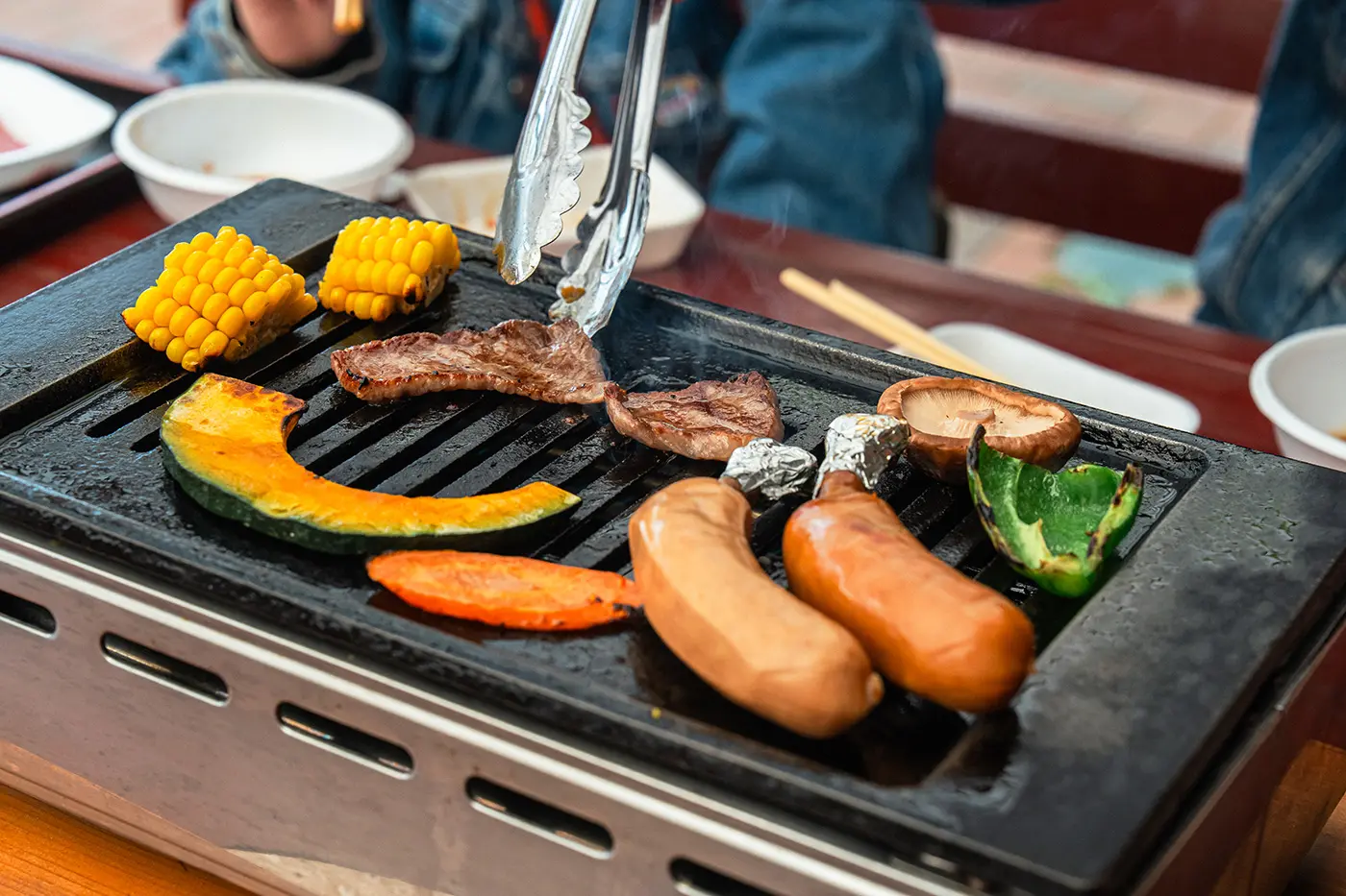 BBQ ingredients being grilled