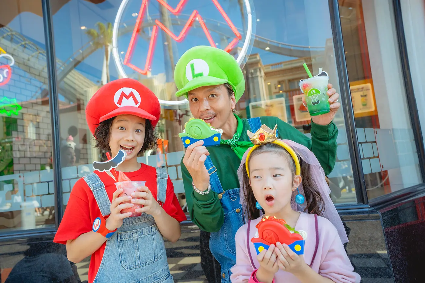 A family in front of Mario Cafe & Store™
