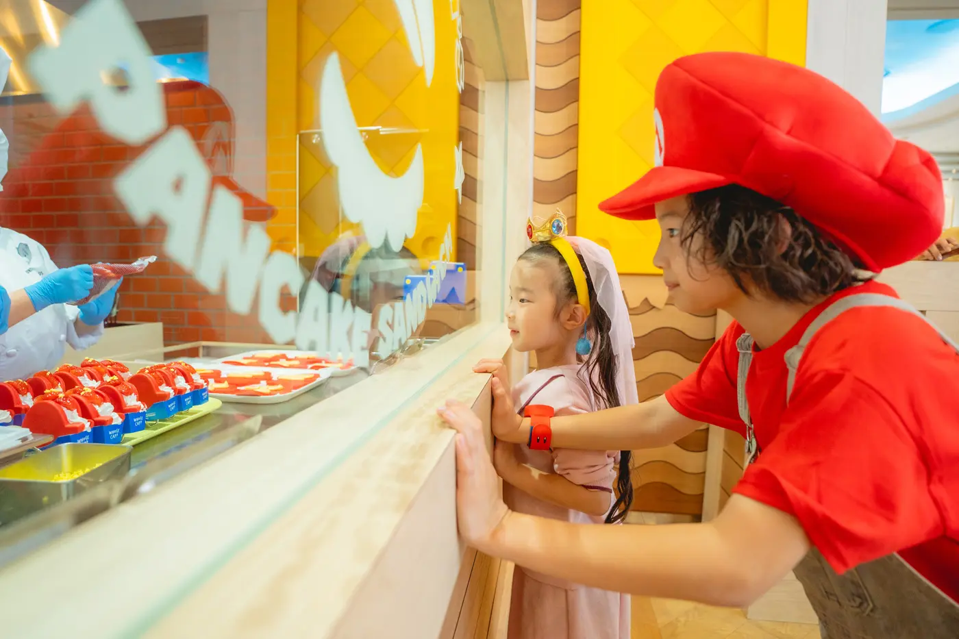 Child peeking into the kitchen