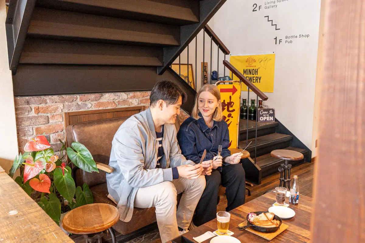 Anne and Yusuke enjoying their meal