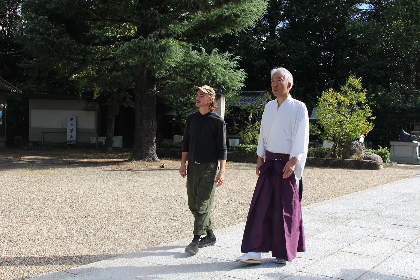 Jackie walking along the approach to the shrine