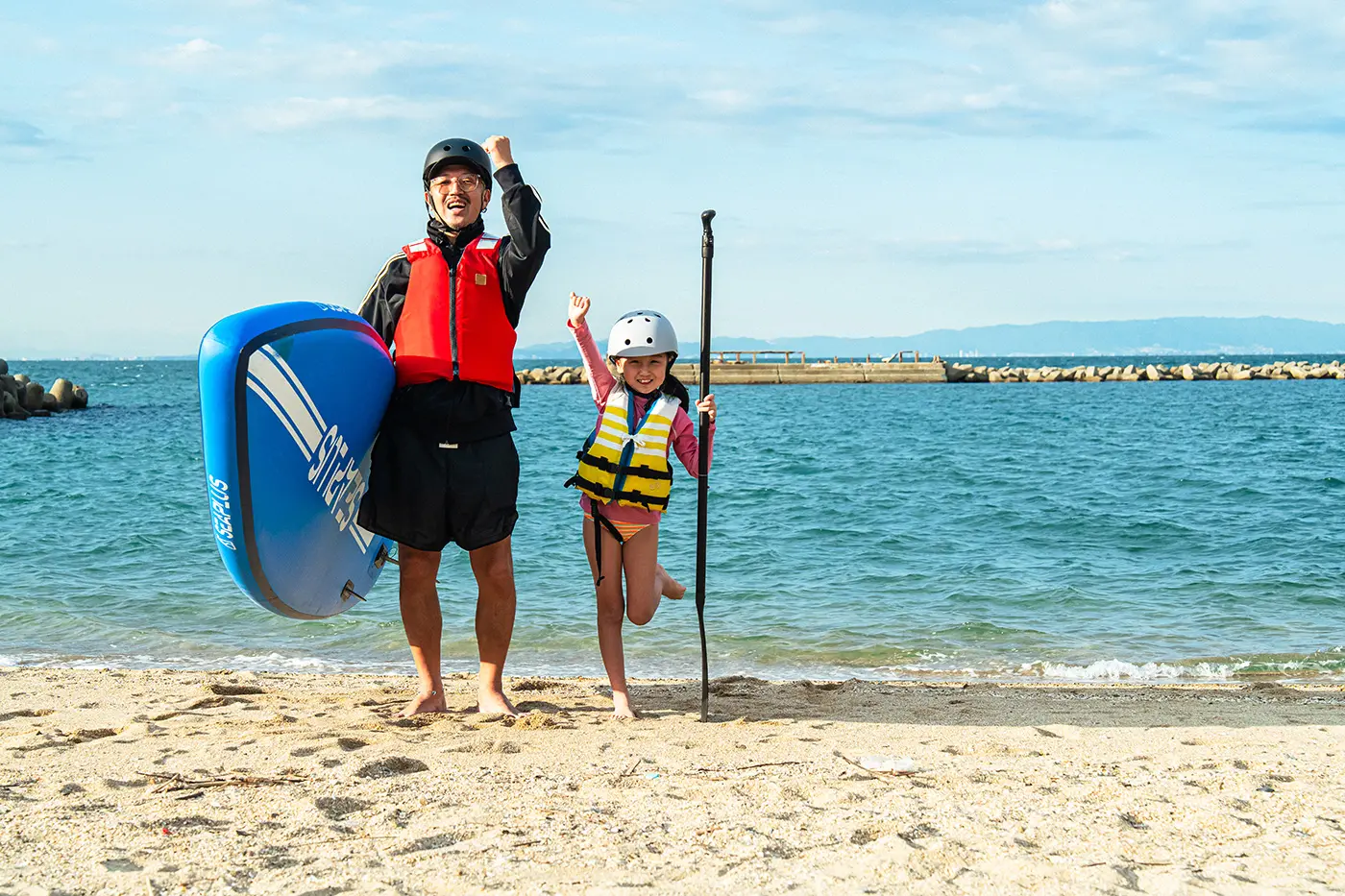 Parents and children enjoying SUP