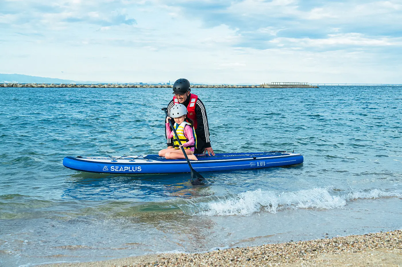 Parents and children enjoying SUP