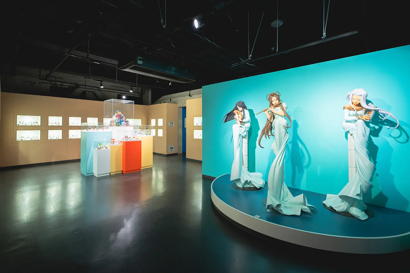 A wide variety of figures are gathered in one place inside the building.