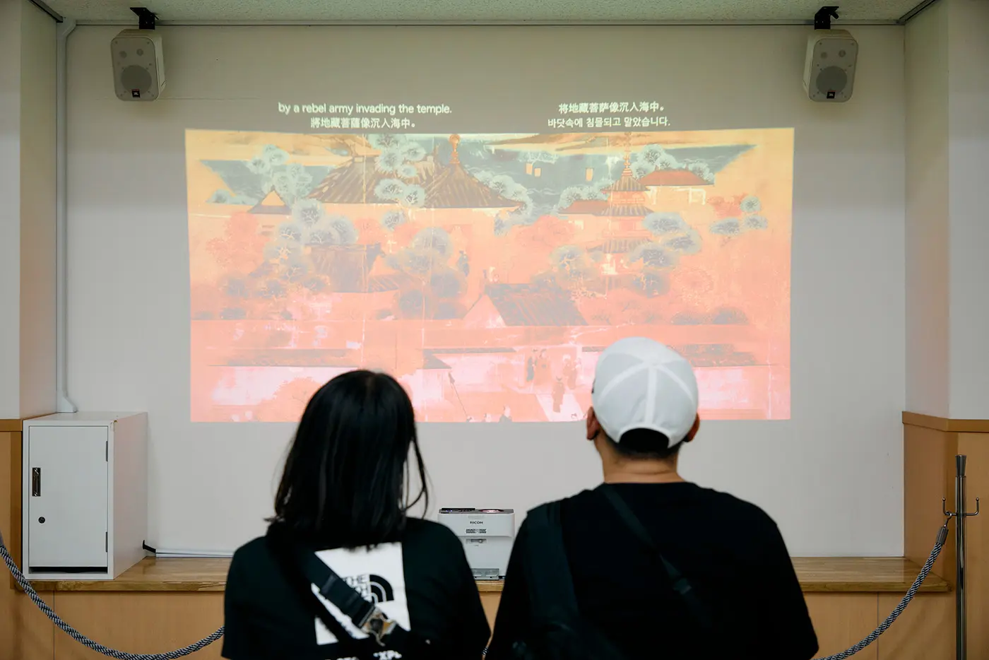 In a corner turret within the castle grounds, a film about the